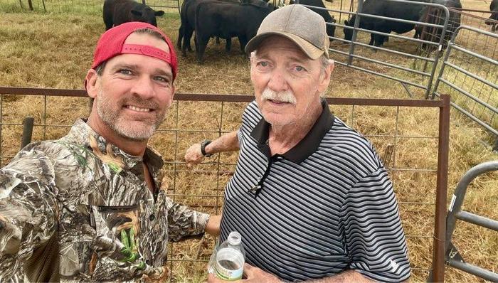 Trey and his dad at the family ranch in Sylvester, Texas